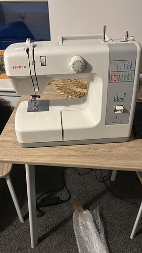 Singer sewing machine model - machine,